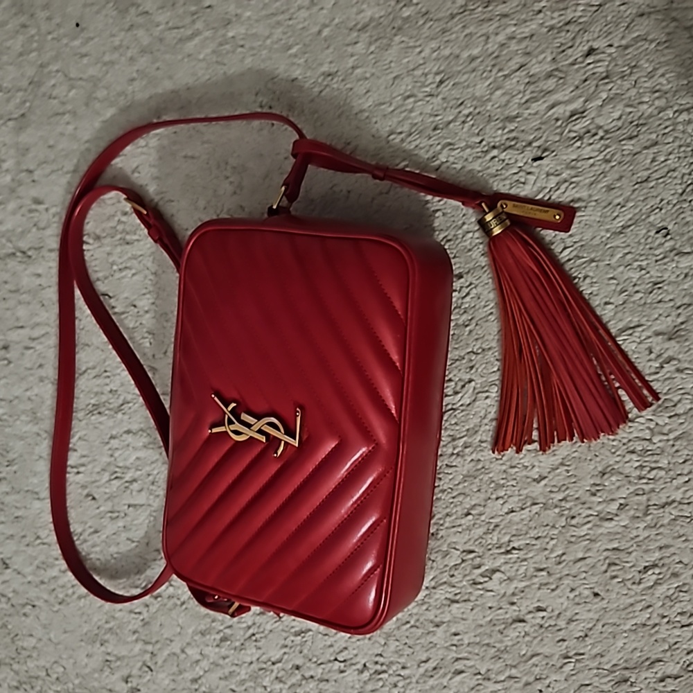 YSL red camera bag with tassel